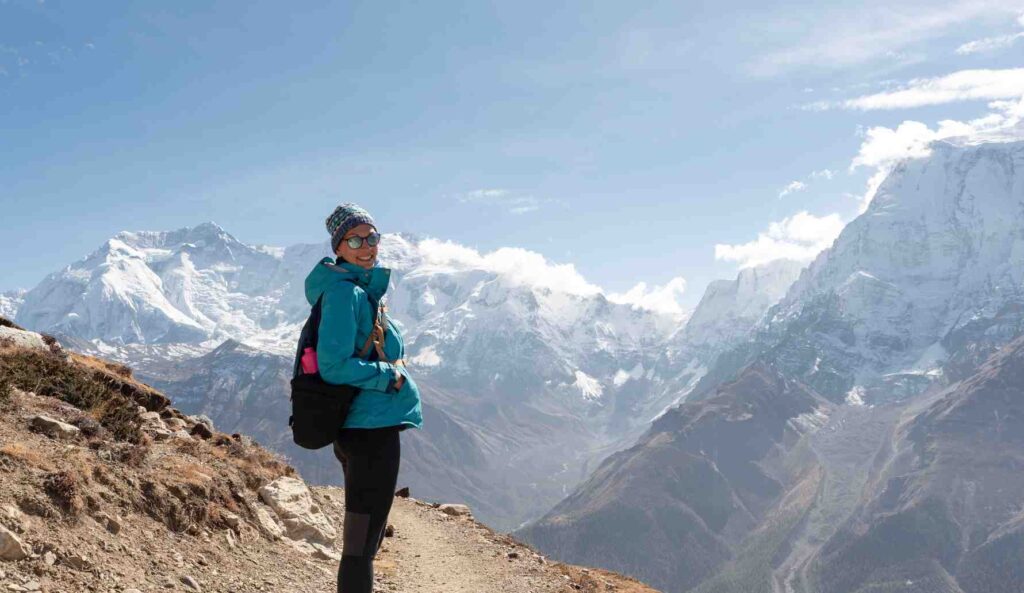 A woman hiking Annapurna Circuit Trek, Himalayas, Nepal.