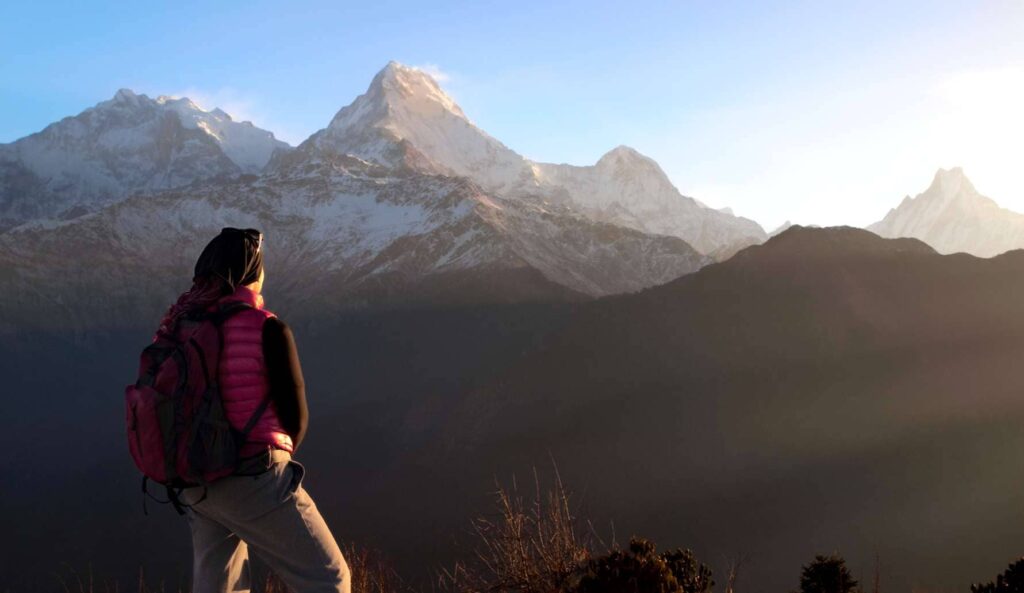 Woman looking Sunrise at Poon Hill, Himalaya