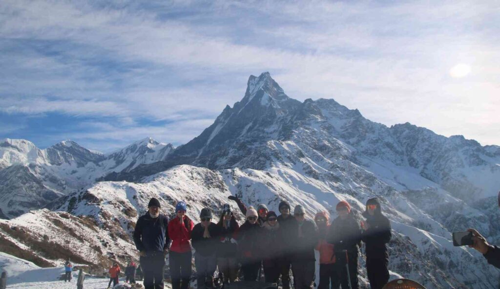 trekkers infront of macchapuchhre himal during mardi himal trek