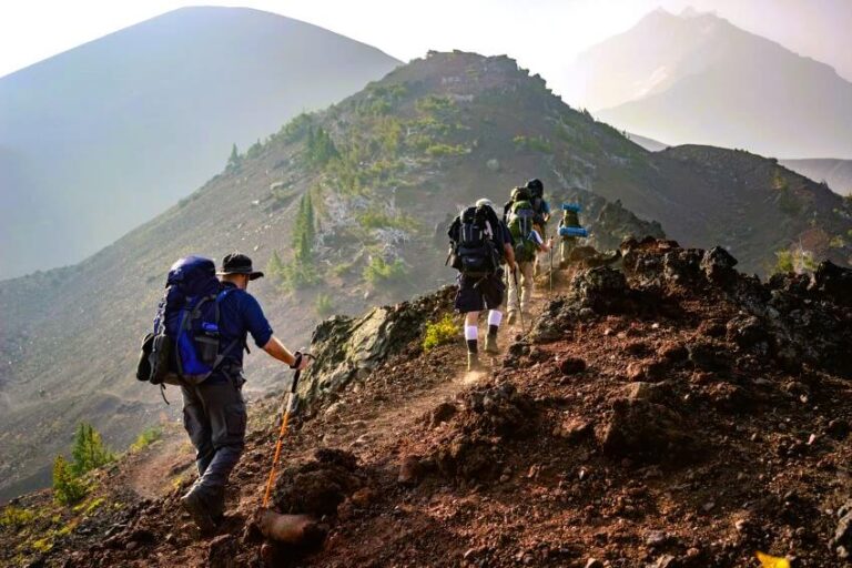 group of people hiking in mountain