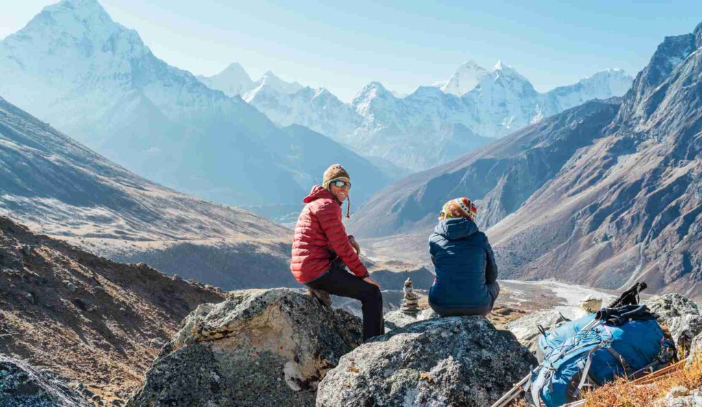 Cute Couple resting on the Everest Base Camp trek in October