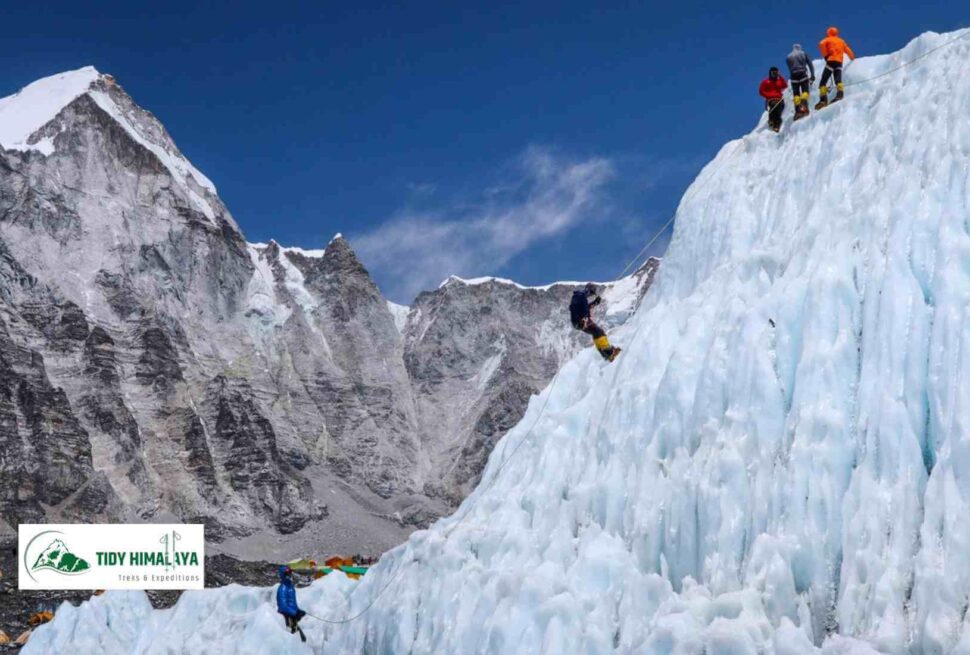 mountaineers climbing on the khumbu glacier