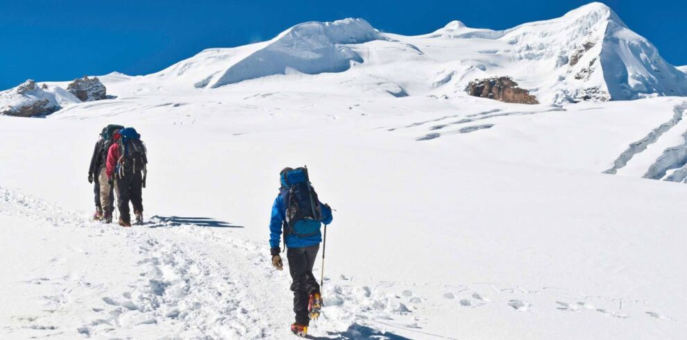 Mountaineers climbing snow summit Mera Peak Climbing